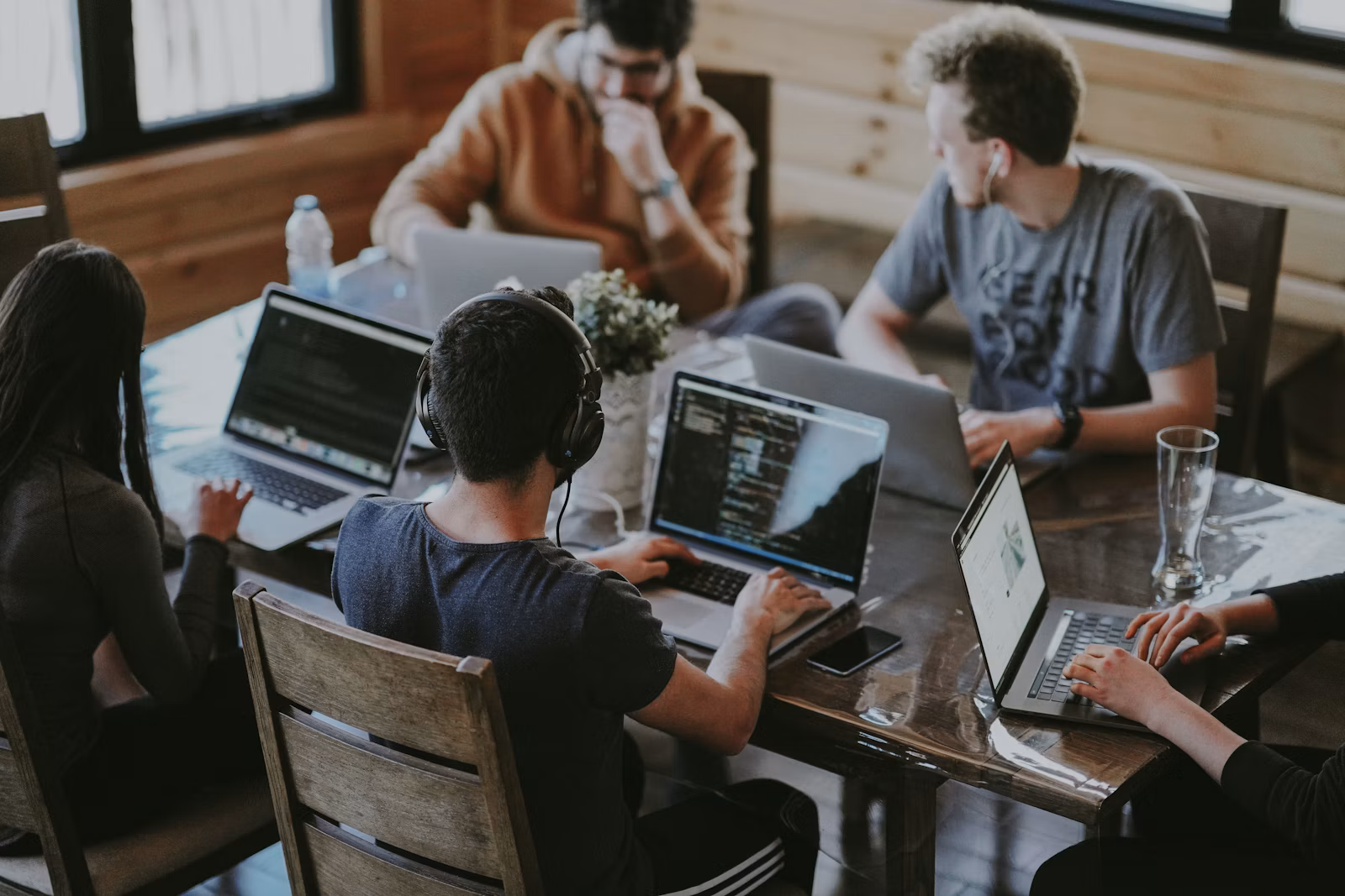 Software team reviewing application improvements